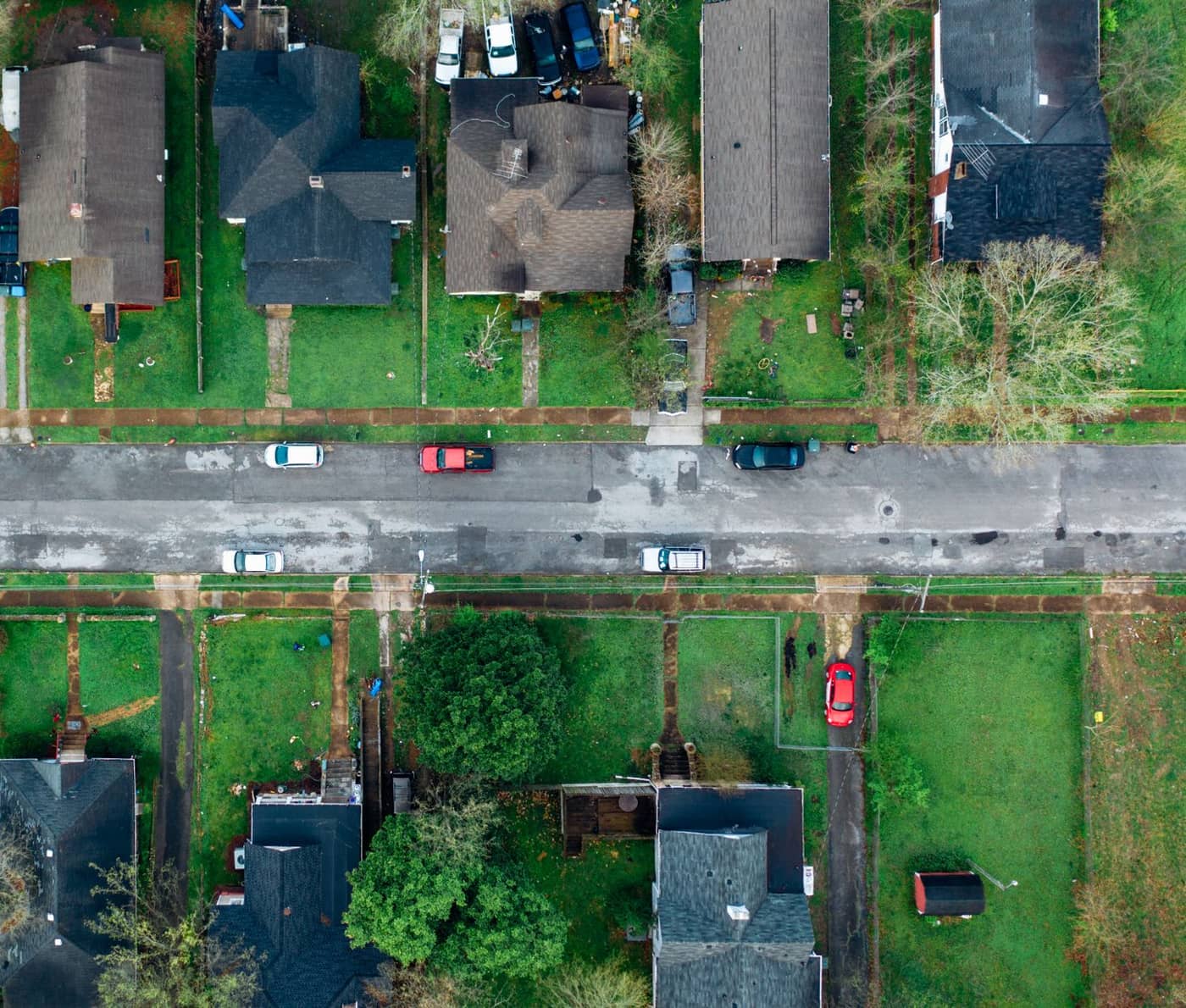 Aerial view of residential lots along a neighborhood street
